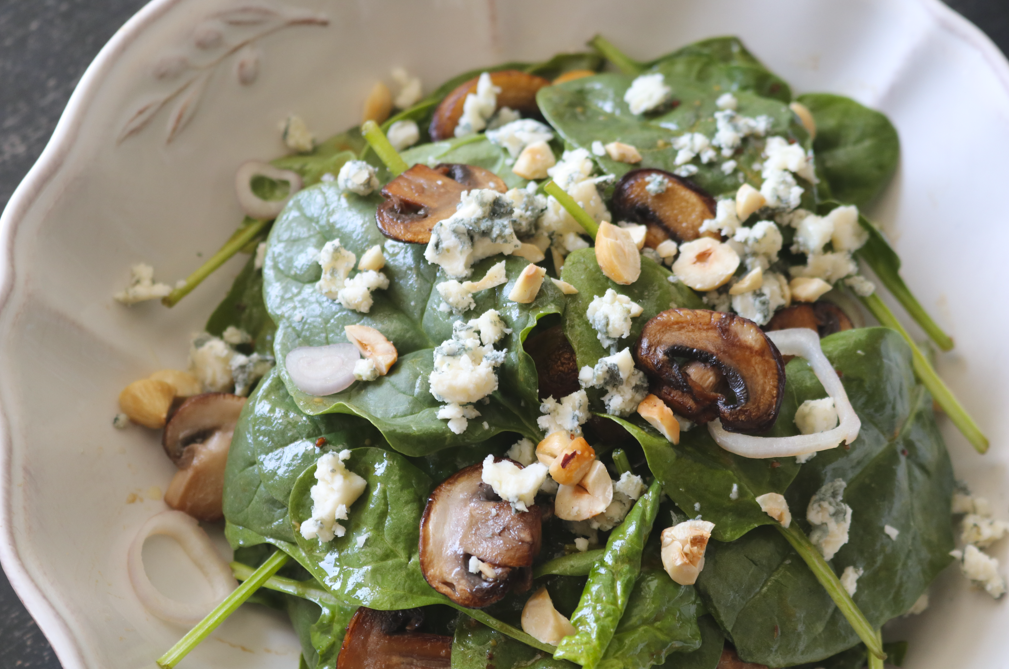 Spinach Salad with Warm Maple-Balsamic Dressing, Sautéed Mushrooms, Toasted Hazelnuts and Original Blue