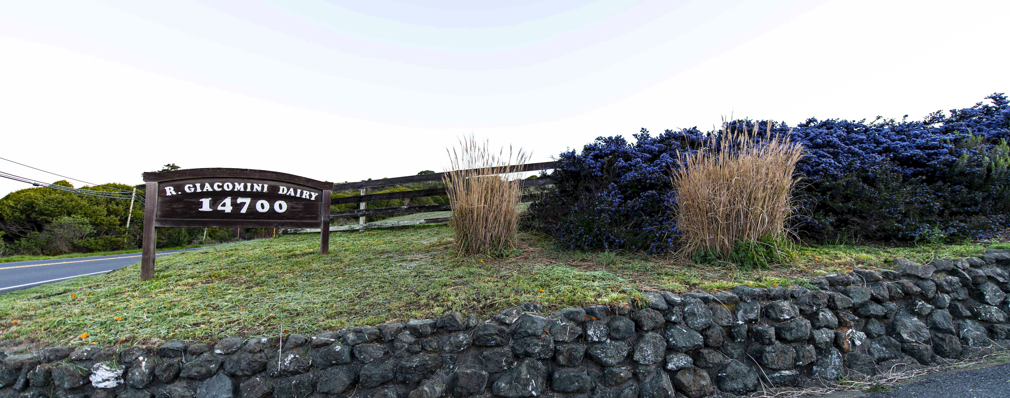 giacomini dairy sign at the entrance to the farm