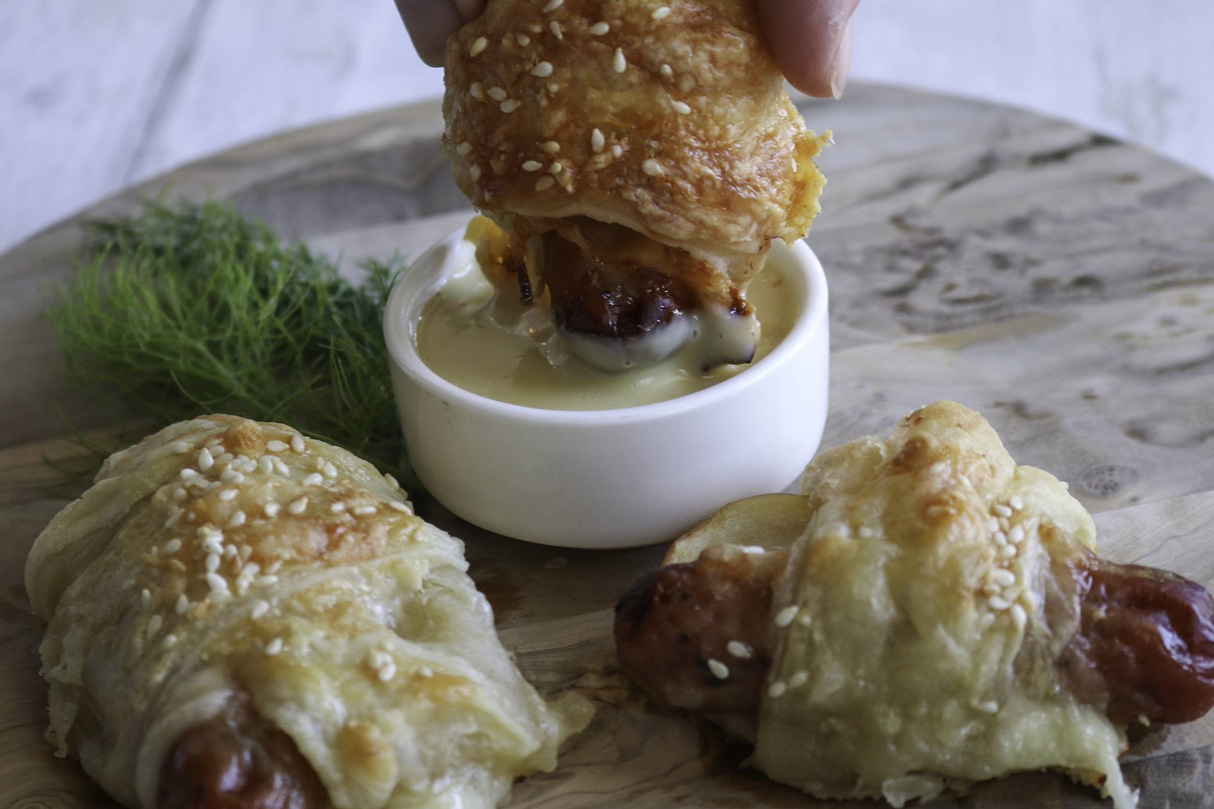 Pigs in  blanket dipped in honey mustard