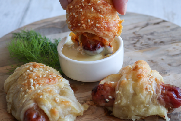 Pigs in  blanket dipped in honey mustard