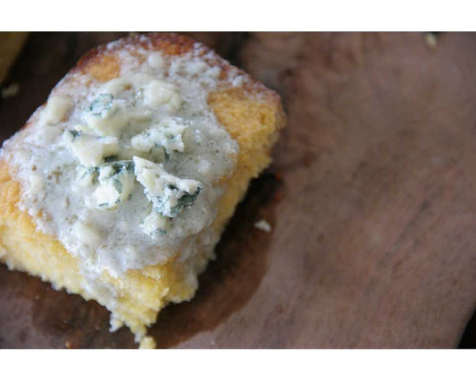 A slice of cornbread with Point Reyes Original Blue Compound Butter