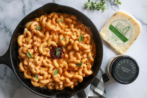 sundried tomato mac and cheese in a skillet