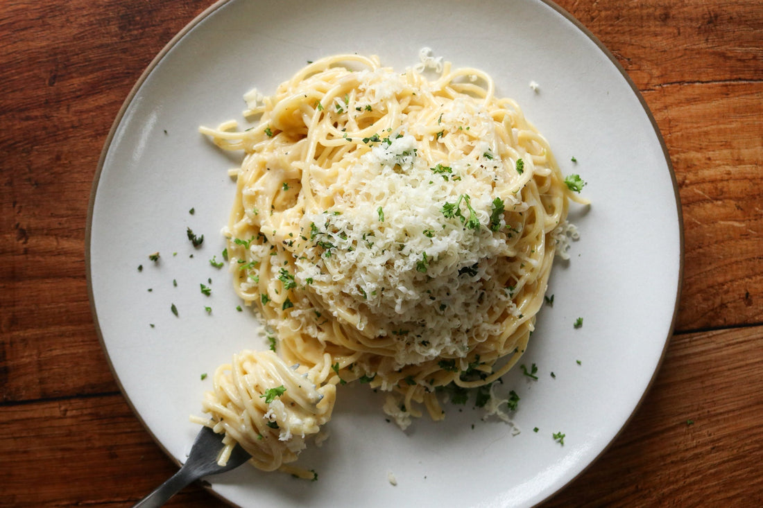 creamy tomatruffle pasta on a plate