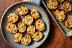 mini cheese toasts on a plate