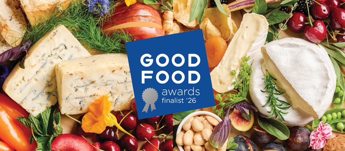 Fennel Blue and Truffle Brie on charcuterie bord with Good Foods award logo