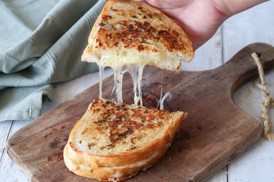 Grilled Cheese on a board with TomaProvence