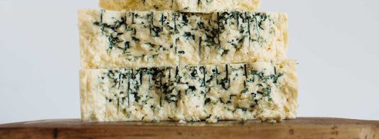 Original Blue Cheese on a brown cheeseboard