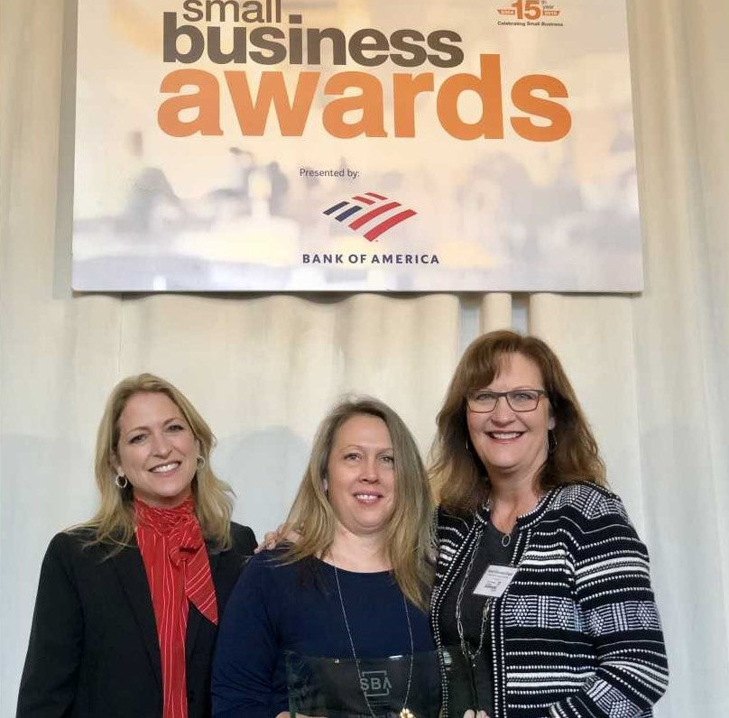 Co-Owners Jill & Diana Giacomini accepting an award for 2019 Small Business of the year award