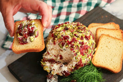 Cheese ball with cranberries on toast