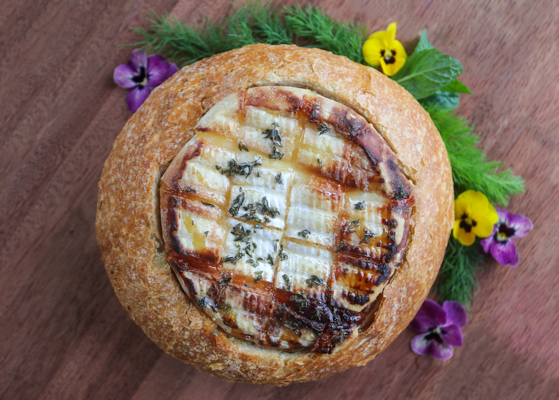 baked truffle brie in a bread bowl