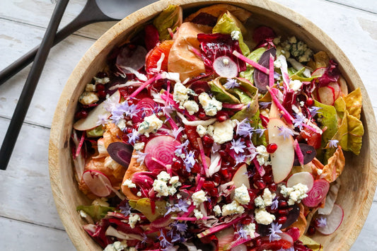 colorful salad in bowl with fennel blue cheese