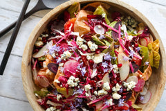 colorful salad in bowl with fennel blue cheese