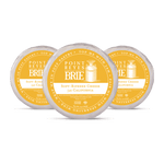 Three containers of Point Reyes Brie cheese on a white background