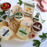 Packaged cheese the moment gift pack on a round board