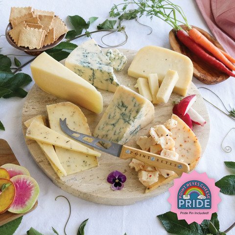 Product: Everyday essentials cheese pack on board with image of PRIDE Pin