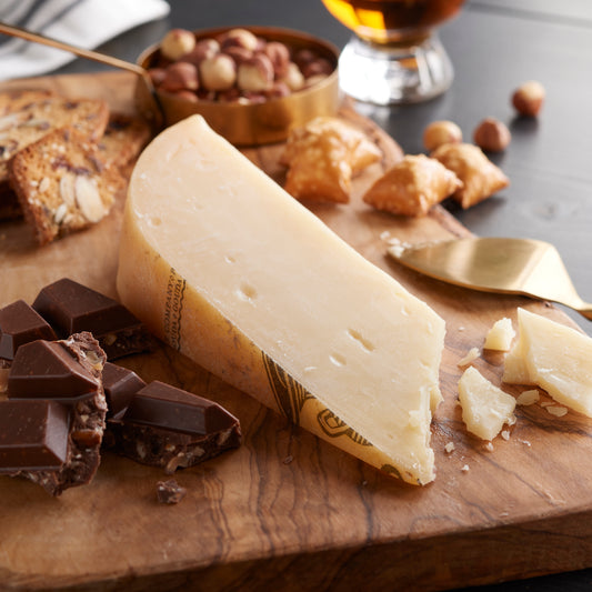 Gouda Cheese with chocolate on a board