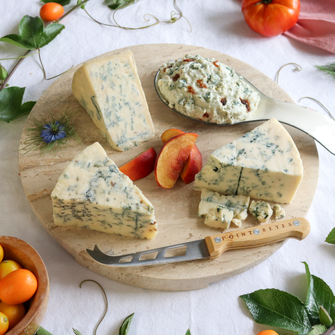 Product: shades of blue cheese pack prepared on a round board