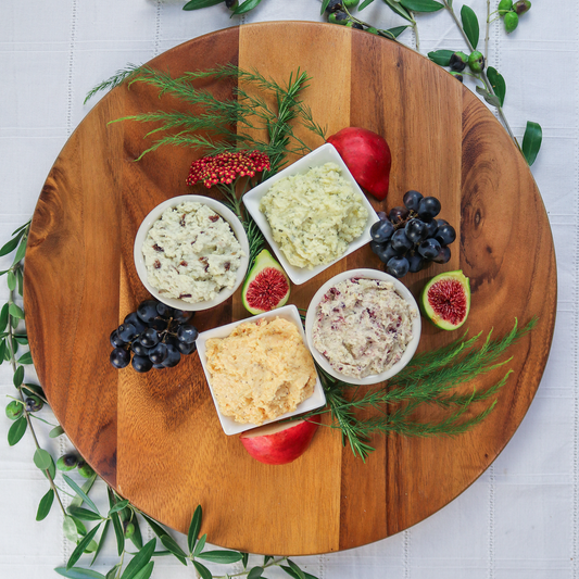 Spread the love cheese spreads in bowls on a board