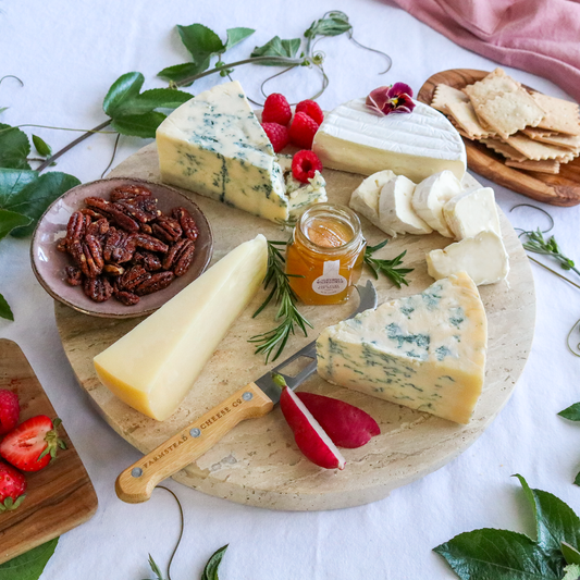 Taste of Point Reyes cheese pack prepared on a round board