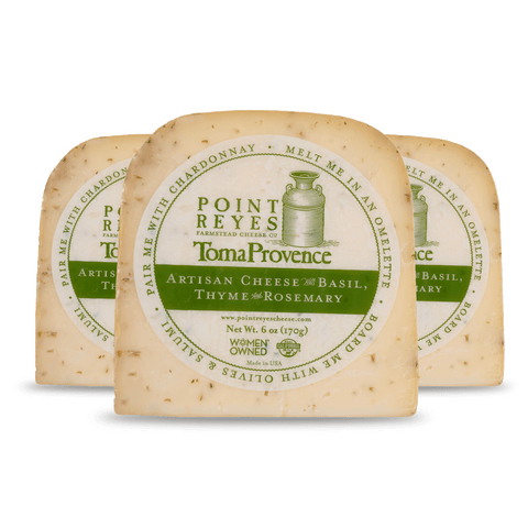 Product: Three blocks of Point Reyes Toma Provèence artisan cheese with labels on a white background