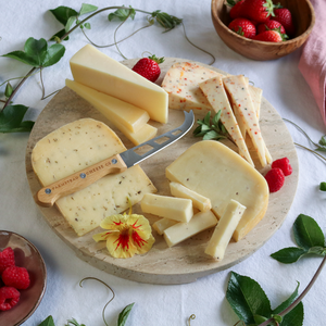 toma with attitude cheese pack prepared on a board