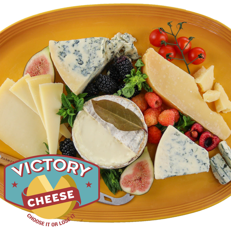 a cheeseboard with the victory cheese logo